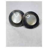 Silver mother of pearl post earrings marked 925.
