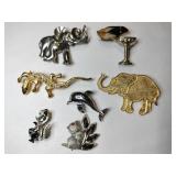 Gold and silver tone animal brooches