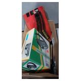 Magnifying head lamp , wall hooks, wire brush and