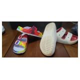 Crocs size 10 and a pair of slides size 9