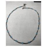 silver bluestone necklace marked 925.     .225oz