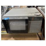 vintage Sears Solid State portable television and