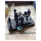 telegraph sounder on a wooden base