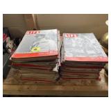 Two stacks of 1940s LIFE magazines