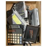 Different styles of pocket calculators