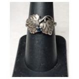 Silver leaf style green stone ring marked