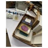 Various picture frames and a wall mount rack