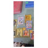 Protected baseball and basketball cards,  ken