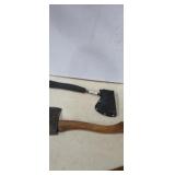 Tool shop hatchet with sheath , and unmarked wood