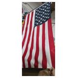 Metal flag pole with American flag