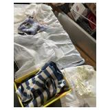 Variety of aprons, doilyï¿½s, and more