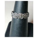silver flower band marked 925 size 6.  .090oz