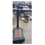 Primitive cast iron/wood base platform scale