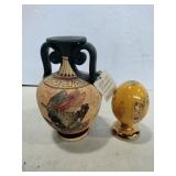 Greene pottery vase and a porcelain egg