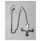 Silver cross pendant Marked Sterling.   .155oz