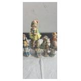 7- 5in village people figurines,  and 1 9in