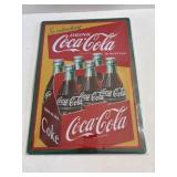 12 in x 17 in metal Coca-Cola sign