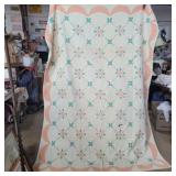Hand made quilt with flower and egg pattern some