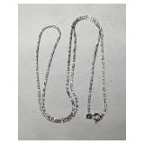 Silver chain marked 925.     .085oz