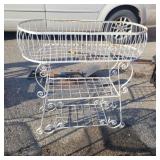 White metal planter 33in tall and 32in wide