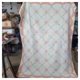 Hand made quilt with flower and egg pattern some