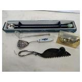 4 unique spoons and mouse cheese knife