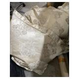 decorative pillows, comforter, and bed skirt