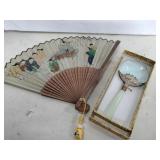 Ornate magnifying glass and  Oriental fan