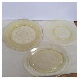 3 yellow depression plates