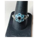Silver light blue stones flower ring marked 925