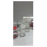 Christmas canisters , and lighted candle