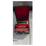 Tiny non working accordion model in wooden box