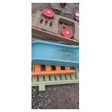 Outdoor playhouse with slide