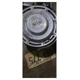 4 rim hubs non matching  and 1966 indiana license
