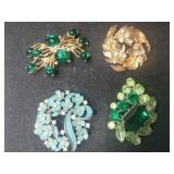 4 rhinestone brooches
