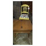 Floral upholstered chair and side table with