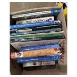 assorted cookbooks and sewing books