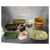 Marked USA mostly pottery planters one has crack