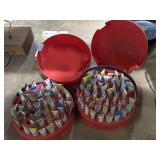 Liquid embroidery tubes in storage containers