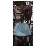 Wooden armless carved back chair