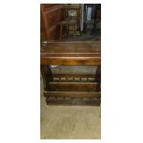 Wooden bench with magazine storage