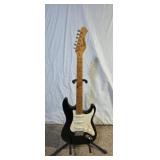 Harmony 6 string electric black and white guitar,