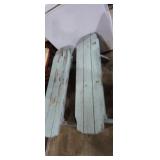 2 matching blue wooden benchs