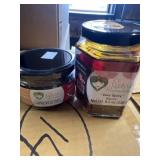 Two jars of da mama gourmet hot sauce