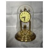 Anniversary clock with glass dome