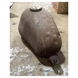 Unidentified metal fuel tank for a motorcycle,