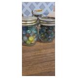 2 small jars with marbles