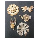 5 gold tone brooches
