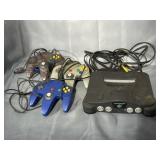 Nintendo 64 game console with 3 controllers