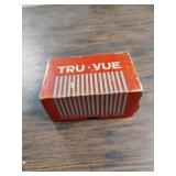 Box of Tru-Vue stereoscope film rolls.